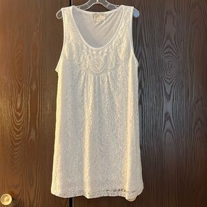 Debbie Morgan dress or long top. White wit lace designs on the front. Size Large